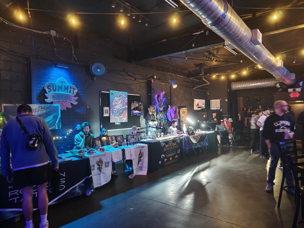 A lineup of artist vendors at Summit Music Hall