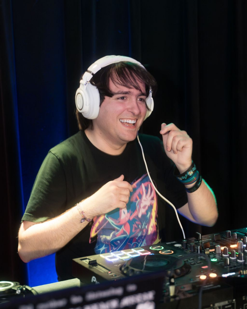 Me, DJ Noisy Pegasus, busy behind the decks at Gotta Glo Fast Columbus
